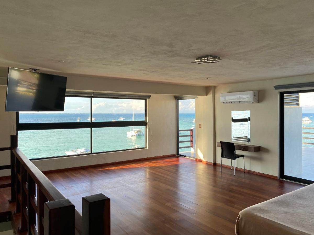Cuxos Hotel Beachfront إيسلا موخيريس المظهر الخارجي الصورة