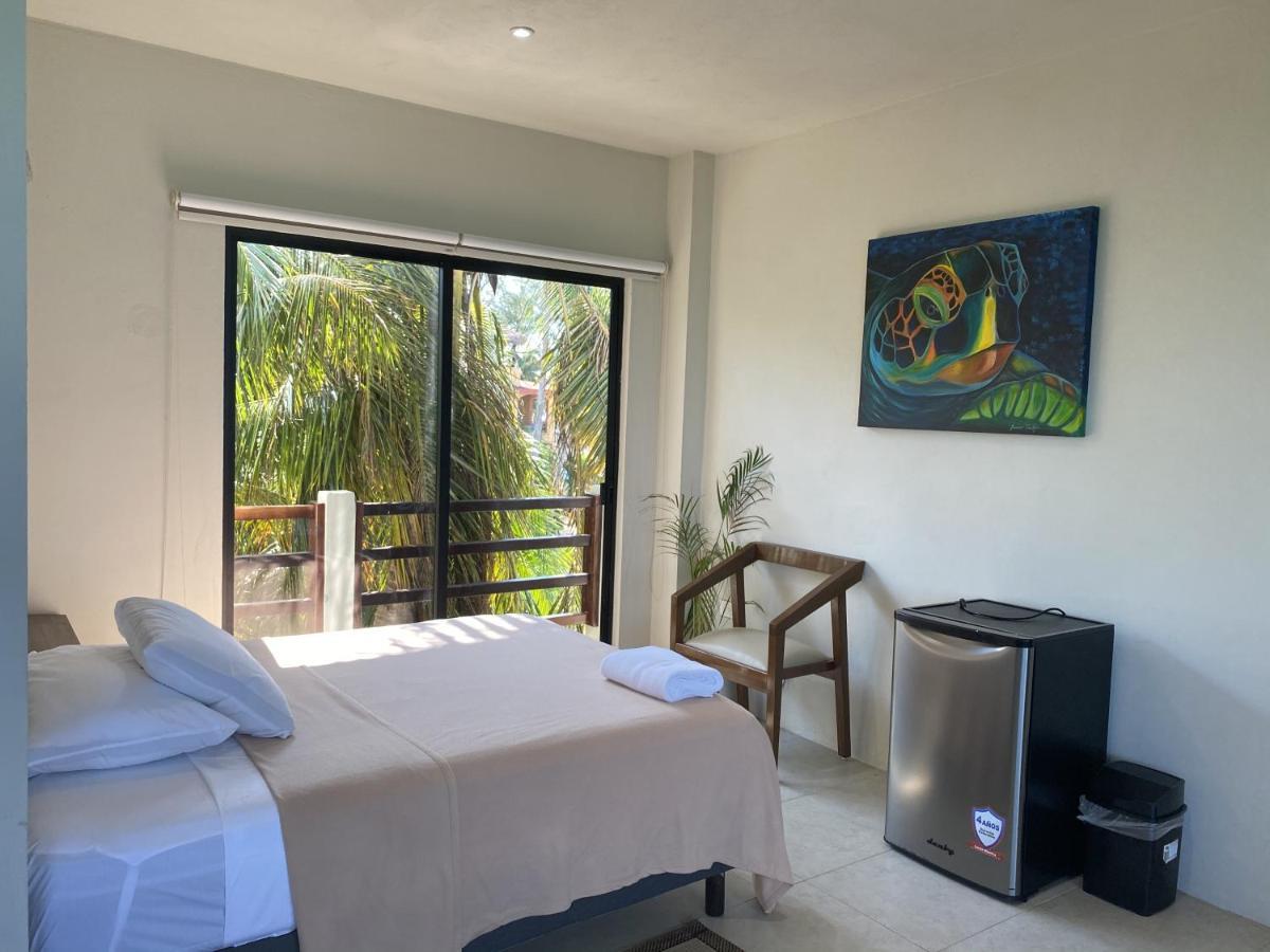 Cuxos Hotel Beachfront إيسلا موخيريس المظهر الخارجي الصورة