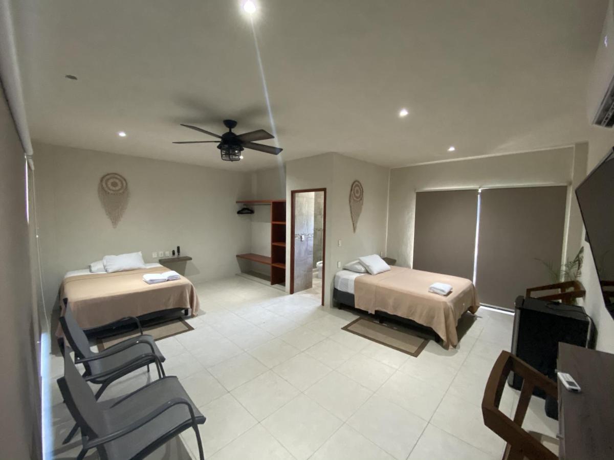 Cuxos Hotel Beachfront إيسلا موخيريس المظهر الخارجي الصورة