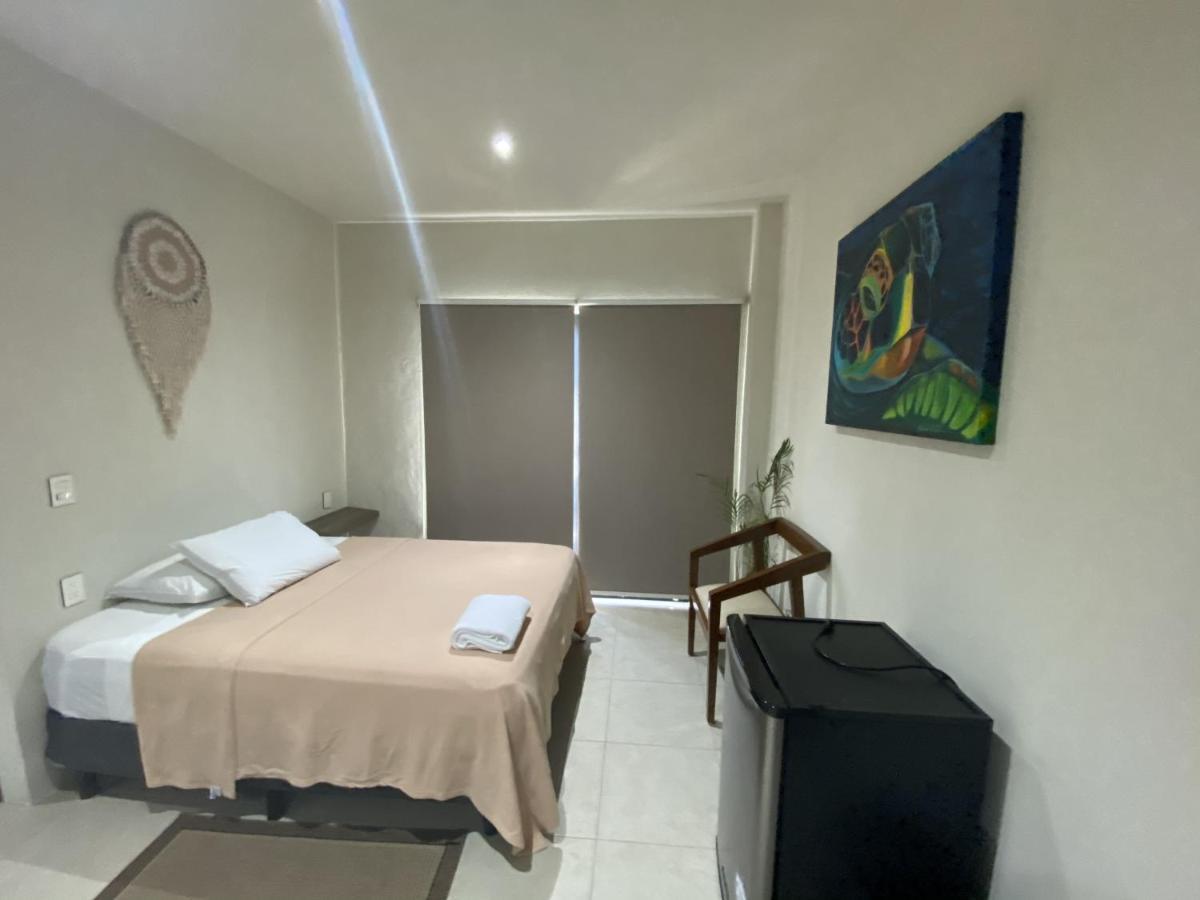 Cuxos Hotel Beachfront إيسلا موخيريس المظهر الخارجي الصورة