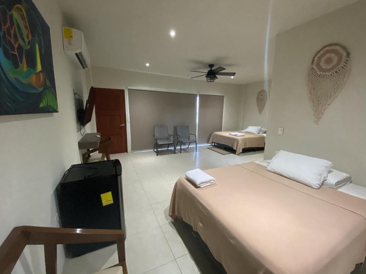 Cuxos Hotel Beachfront إيسلا موخيريس المظهر الخارجي الصورة