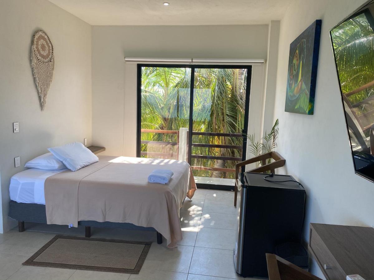 Cuxos Hotel Beachfront إيسلا موخيريس المظهر الخارجي الصورة
