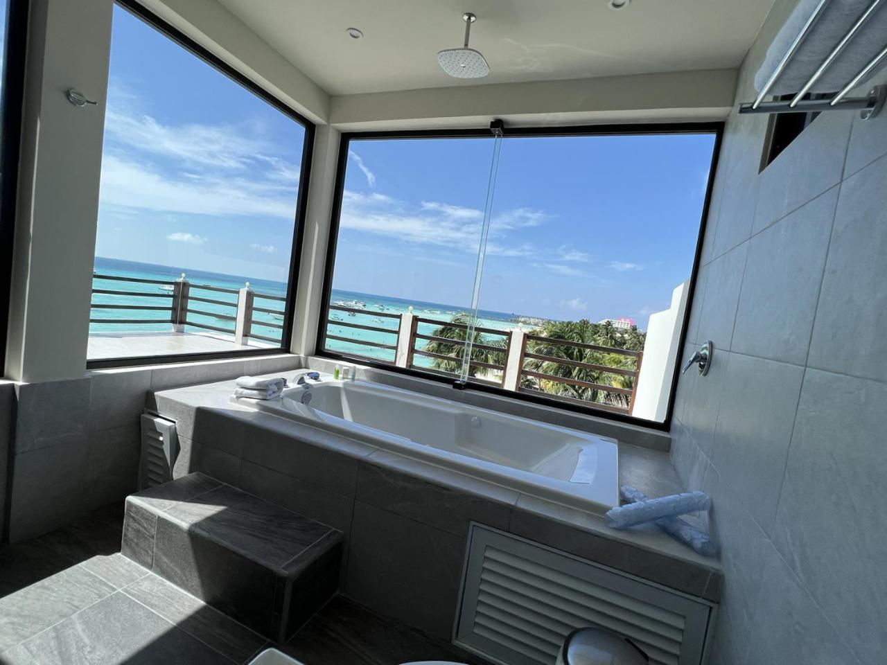 Cuxos Hotel Beachfront إيسلا موخيريس المظهر الخارجي الصورة