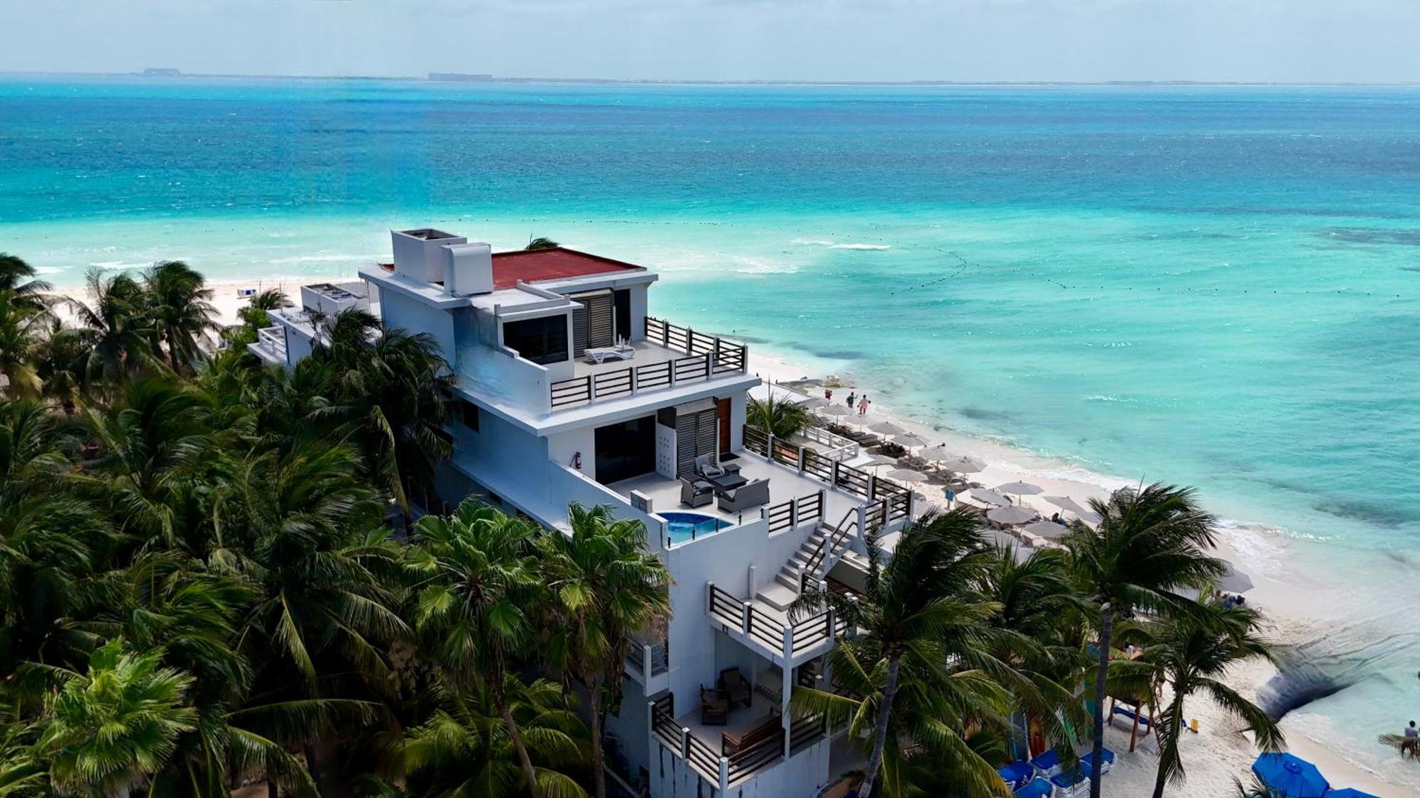 Cuxos Hotel Beachfront إيسلا موخيريس المظهر الخارجي الصورة
