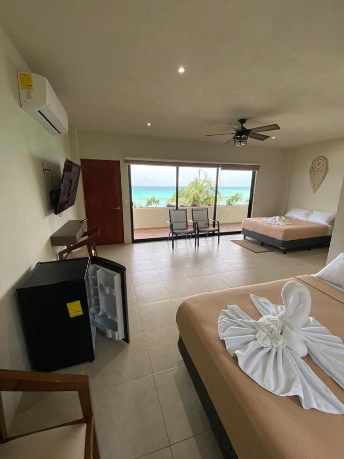 Cuxos Hotel Beachfront إيسلا موخيريس المظهر الخارجي الصورة