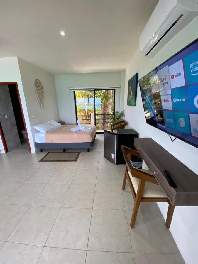 Cuxos Hotel Beachfront إيسلا موخيريس المظهر الخارجي الصورة
